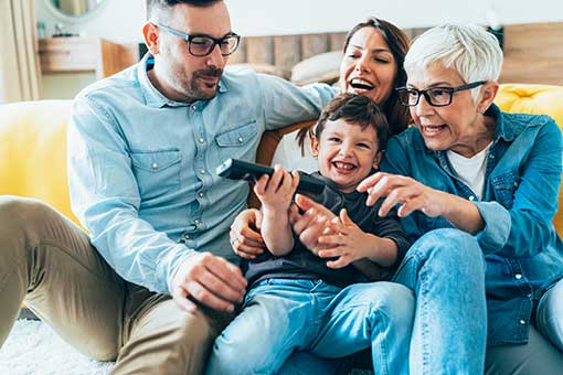 Family gathered together on the couch